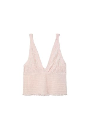 Bralette en dentelle rose clair avec décolleté en V profond, larges bretelles et tissu texturé sur la partie inférieure.