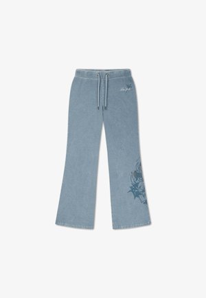 Pantaloni della tuta azzurri chiaro a gamba larga con coulisse in vita, piccolo testo ""New York"" vicino all'anca e grafica scura sulla parte bassa della gamba.