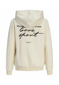 Kremfarvet hættetrøje med sort håndskrevet tekst "Core Sport" og trykte detaljer på ryggen, med ribstrikkede manchetter og talje.