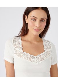 Damart MANCHES COURTES DOUCEUR THERMOLACTYL - Maglietta intima - blanc
