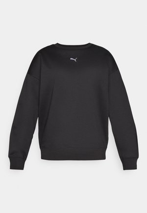 Mustmustööt, millel on ümmargune kaelus ja pikad varrukad. Omab pehmet kangast, soonikuid mansette ning väikest valget Puma logo rinnal.