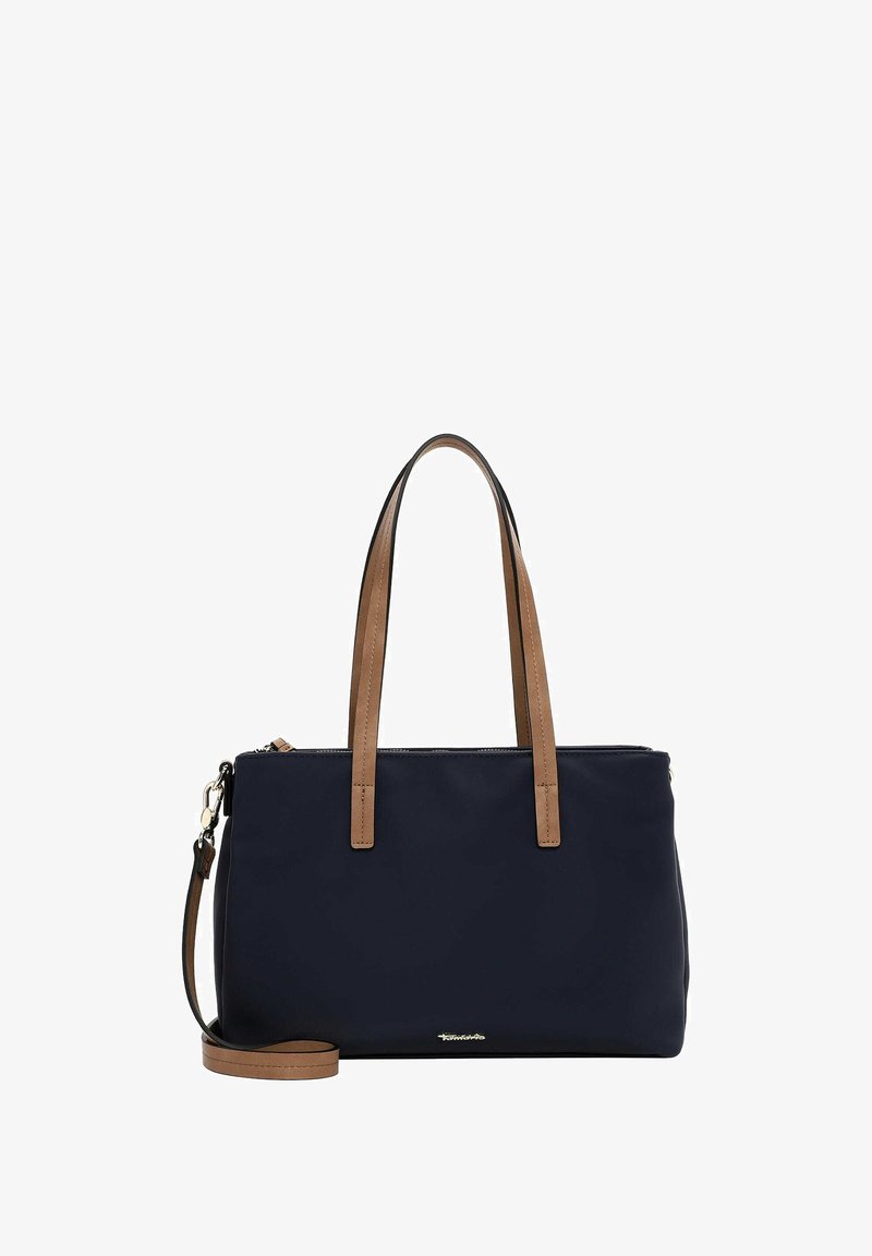 La beige laivakassi, jossa on ruskeat nahkahihnat, vetskari ja säädettävä olkahihna. Sujuva pinta, minimalistinen muotoilu ja logotieto.