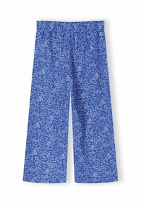 Pantalon large bleu avec taille élastique, couvert d'un petit motif floral blanc, sur fond blanc.