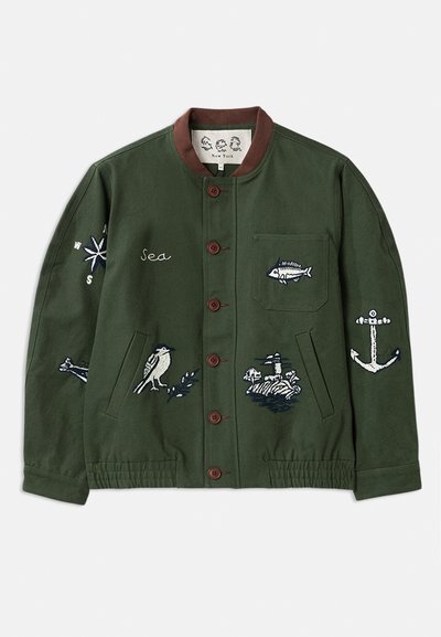 Green jacket with brown collar, button closure, and multiple embroidered designs including fish, a bird, and an anchor.