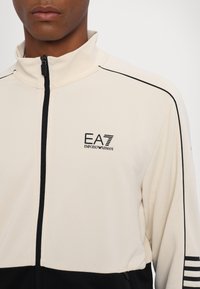 EA7 Emporio Armani TUTA SPORTIVA - Tracksuit - sand/black