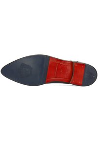 Suola di scarpa in pelle con forma appuntita, strato esterno blu scuro, strato interno rosso con dettagli in rilievo e cuciture decorative.