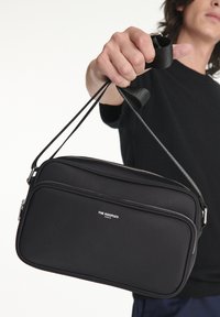 The Kooples SAC UNISEX Cross body bag black