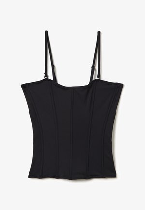 Zwart korset-top met verstelbare bandjes, voorzien van verticale naden voor structuur, een gladde textuur en een aansluitend ontwerp.