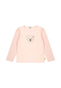Camisa de manga larga rosa hecha de tela suave, con un aplique de cara de oso en el centro y mangas abullonadas. Etiqueta en el dobladillo.