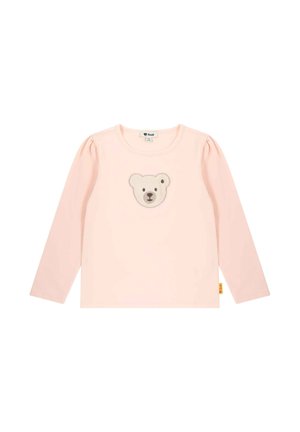 Rosa Langarmshirt aus weichem Stoff, mit einer Bärenkopf-Applikation in der Mitte und Puffärmel. Etikett am Saum.