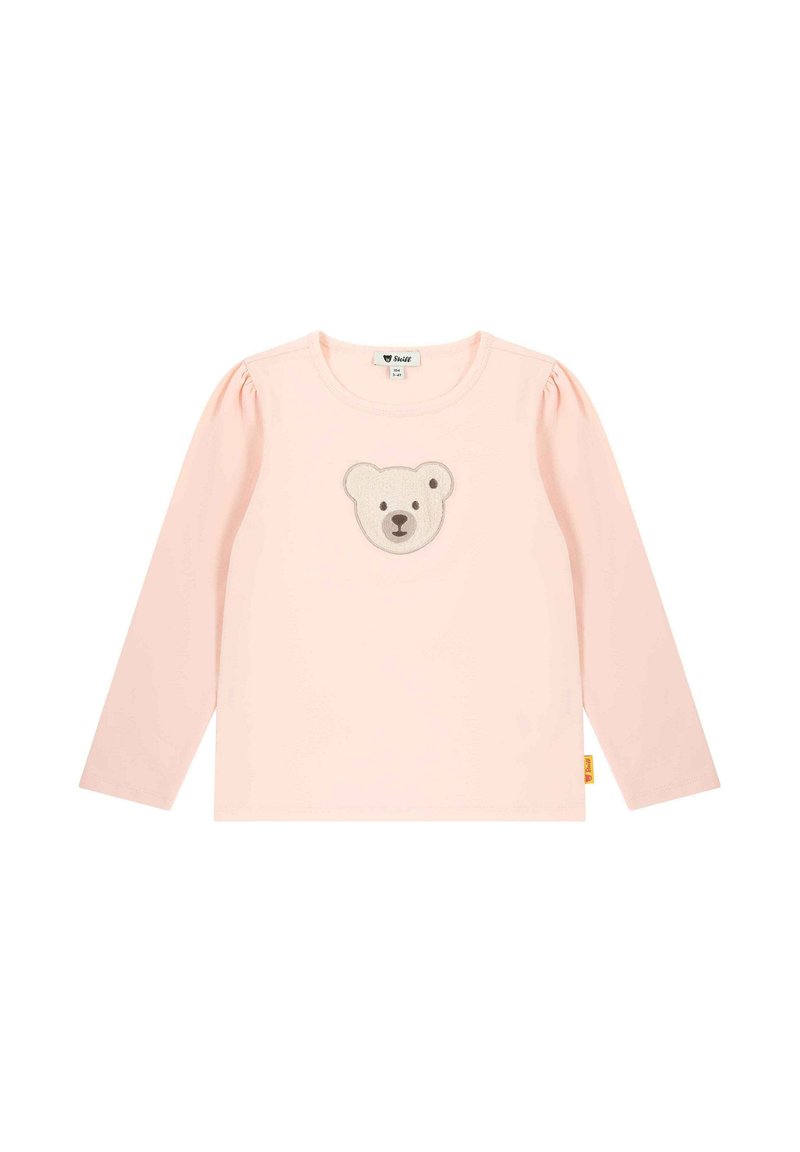 Camisa de manga larga rosa hecha de tela suave, con un aplique de cara de oso en el centro y mangas abullonadas. Etiqueta en el dobladillo.