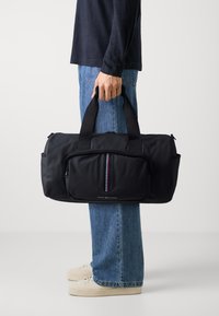 Tommy Hilfiger CORP DUFFLE UNISEX - Weekend bag - black
