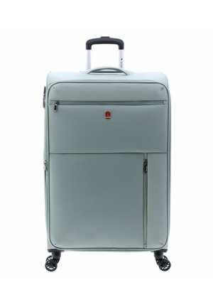 Valise rigide vert clair avec une poignée télescopique, deux poches avant et quatre roues pivotantes noires pour une mobilité aisée.