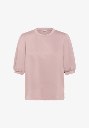 Pale rózsaszín, rövidujjú felső, puha anyagból készült, kerek nyakkivágással és puffos ujjakkal, laza, dobozszerű szabással.