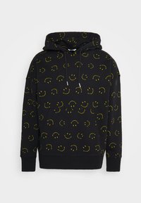 Black hoodie with yellow smiley face pattern, drawstring hood, kangaroo pocket, ribbed cuffs and hem, made of soft fabric.