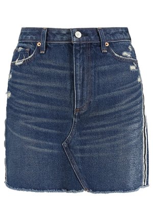 Farkkujen minihame, jossa edessä nappikiinnitys, kulutetut yksityiskohdat, repsottava helma ja sivuviirut.