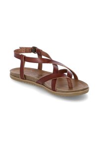 Brown leather sandal with crisscross strap design, open toe, textured insole, and a flexible rubber sole. Ankle strap with buckle detail.