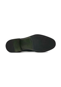 Black rubber sole with a smooth texture and green leather accent. Features a rounded toe, decorative stitching, and embossed lettering.