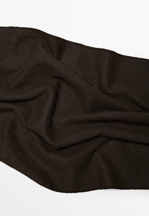 Dark brown fabric draped smoothly, exhibiting a soft texture and slight sheen with uneven edges and gentle folds, creating a flowing appearance.
