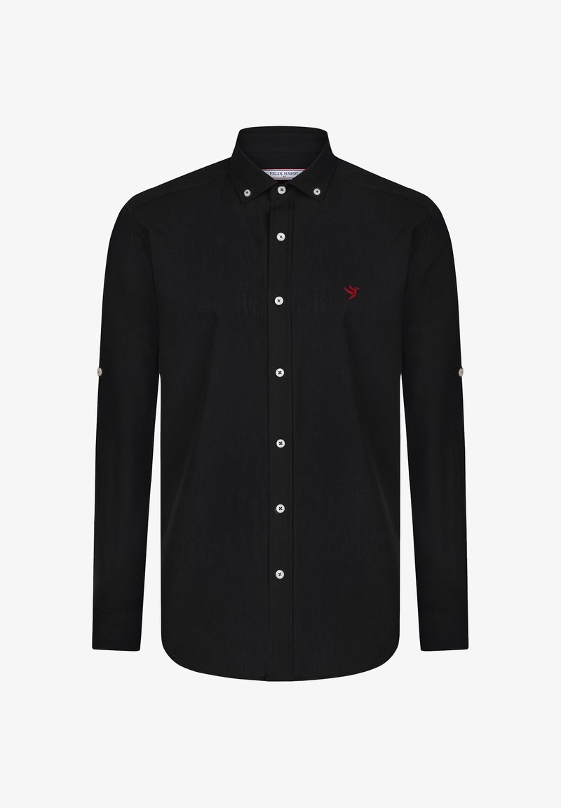 Chemise noire à manches longues avec boutons blancs, petit logo d'oiseau rouge sur la poitrine gauche et pointes de col boutonnées.