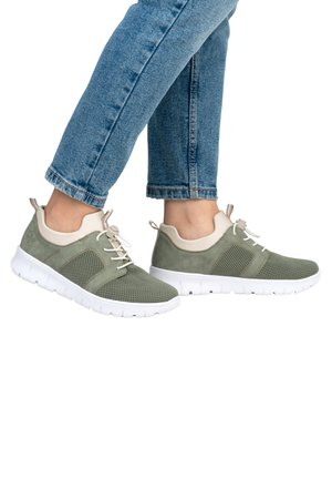 Light green sneakers with mesh and suede panels, white soles, and a lace-up design. Textured materials with contrasting accents.