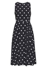 Černé bezramínkové šaty s bílými puntíky, přiléhavá sukně a zavazovací pásek v pase. Sukně má rozšířený střih a sahá po lýtka. Materiál je směs bavlny.