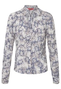 Blouse à manches longues boutonnée avec motif serpent bleu et beige et détail noué au col, étiquette marquée HUGO.