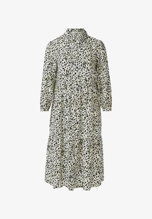 Robe imprimée léopard en crème et noir, avec un boutonnage sur le devant, un col, des manches trois-quarts et un ourlet en étages. Tissu doux et fluide.