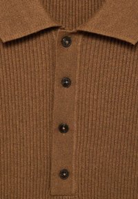 Brown ribbed polo shirt featuring a button placket with four dark buttons. The fabric has a textured finish. Collared design.