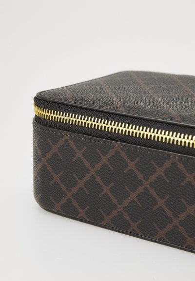 Black and brown patterned cosmetic bag with a textured surface and a gold zipper running along the top edge.