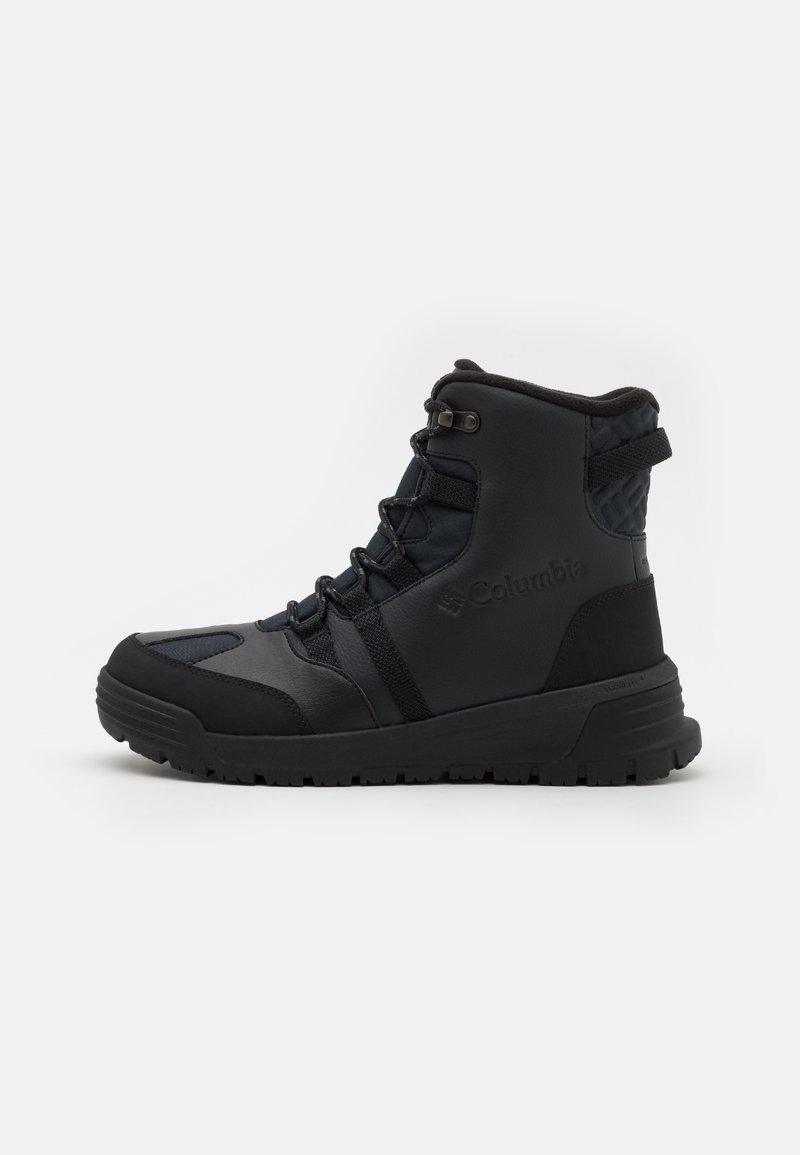 Botte d'hiver Columbia noire montante avec cheville rembourrée, laçage à l'avant et semelle texturée pour une bonne adhérence en extérieur.