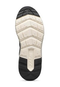 Suola di sneaker nera e crema con un motivo in zigzag testurizzato; presenta scanalature profonde per la trazione e una superficie liscia e imbottita.
