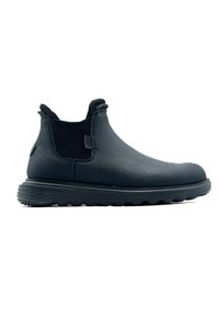 Botas de tobillo de cuero negro con paneles de malla elástica, punta redondeada y suela de goma texturizada que presenta un patrón ondulado para mayor agarre.