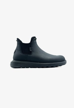 Bottines en cuir noir avec des panneaux en maille extensible, un bout arrondi et une semelle en caoutchouc texturée présentant un motif en vagues pour une meilleure adhérence.