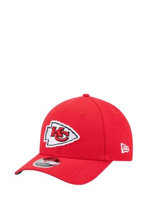 Red baseball cap made of cotton with a structured design. Features an embroidered Kansas City Chiefs logo on the front and a curved brim.