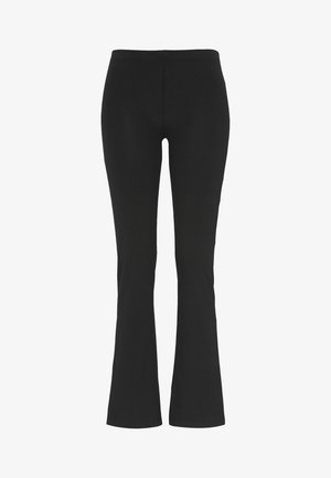 Zwarte flared leggings van een rekbaar katoenmixmateriaal, met een gladde textuur en een elastische tailleband voor comfort.