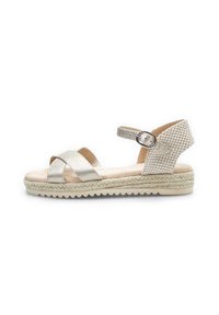 Srebrna espadrille sandala s prepletenimi trakovi, teksturirano zgornje delo, nastavljiv pašček na gležnju, jutik pritrjen podplat in gumijast profil.