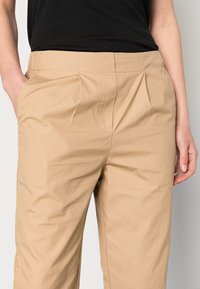 OPUS Tygbyxor - beige