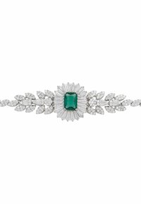 Emerald and diamond bracelet featuring a central emerald cut stone in a floral design, surrounded by round and baguette diamonds. Silver metal.