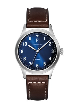 Orologio rotondo argento con quadrante blu, numeri arabi bianchi, lancette argento che indicano le 10:10:36 e cinturino in pelle marrone con cuciture bianche.
