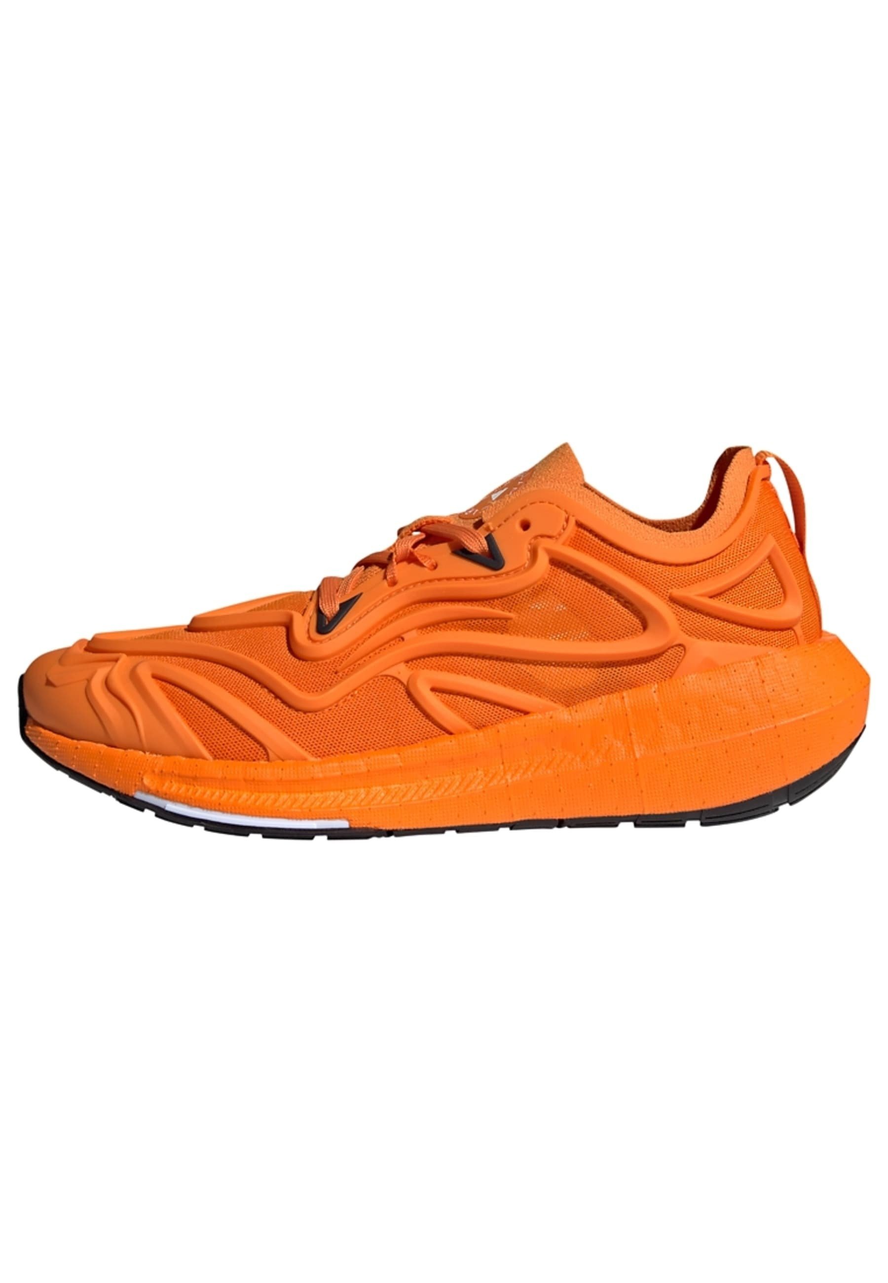 adidas by Stella McCartney ULTRABOOST SPEED - Road running shoes - unity  orange cloud white core black/orange - Zalando.co.uk
