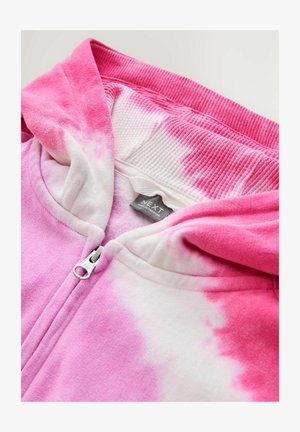 Hanorac roz și alb cu fermoar și model tie-dye, cu tiv și manșete tivite. Are un fermoar argintiu și o etichetă în interiorul gulerului. Textură moale a țesăturii.