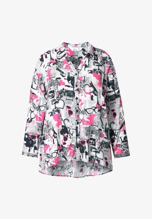 Blusa de mangas largas en blanco, negro y rosa con un estampado gráfico mezclado, que presenta corazones, gafas y acentos de texto. Cierre frontal de botones.