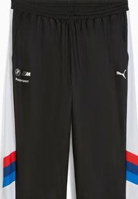 Sorte træningsbukser med elastisk talje, der har hvide paneler og røde og blå striber på siderne. Viser BMW Motorsport og Puma-logoer.
