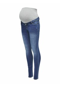 Jeans premamá en denim azul con un panel de punto gris por encima de la barriga, que presentan un ajuste skinny, diseño de cinco bolsillos y ligeros detalles de desgaste.