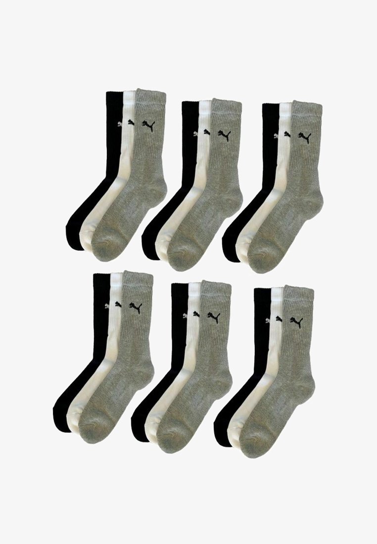 Sechs Paar Socken in Schwarz- und Grautönen mit geripptem Design und kontrastierenden weißen Bündchen; das Logo ist auf jeder Socke sichtbar.