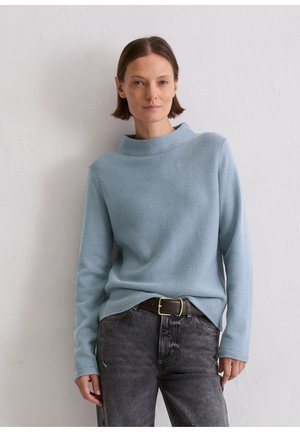 - Sweter