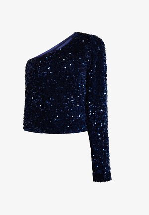 Eén-schouderse marineblauwe pailletten top met lange mouwen, een aansluitende silhouet en een glinsterende textuur.