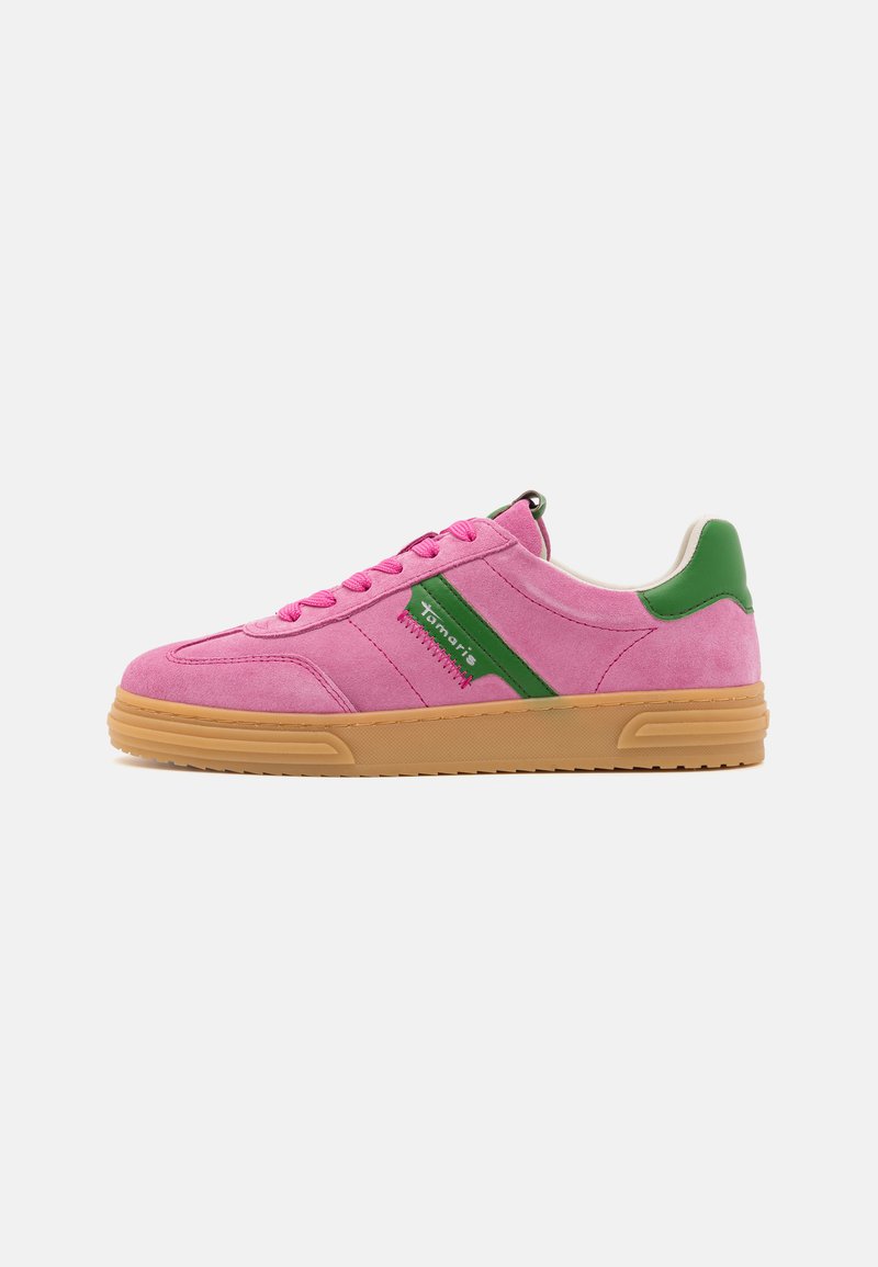 Pink suede sneaker with green accents, round toe, and rubber sole. Features a logo patch and flat laces. Stitched details on the sides.