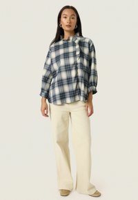 Soaked in Luxury Blouse - navy checks